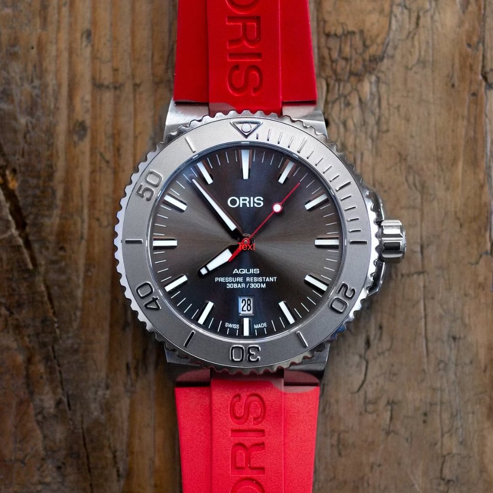 ORIS AQUIS DATE RELIEF - RED STRAP WATCH